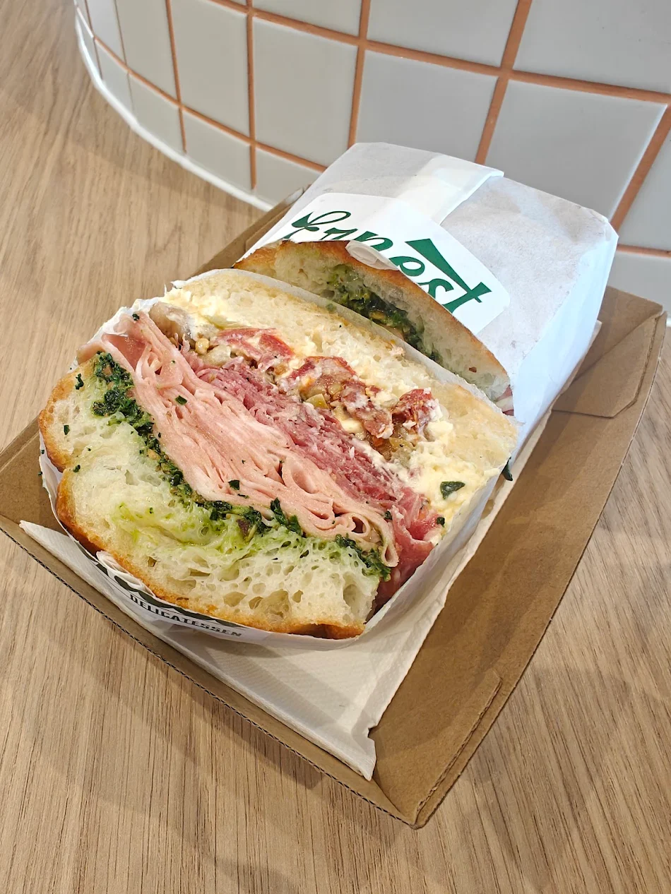 Deli meats and meatball sandwiches in Ernest Deli packaging