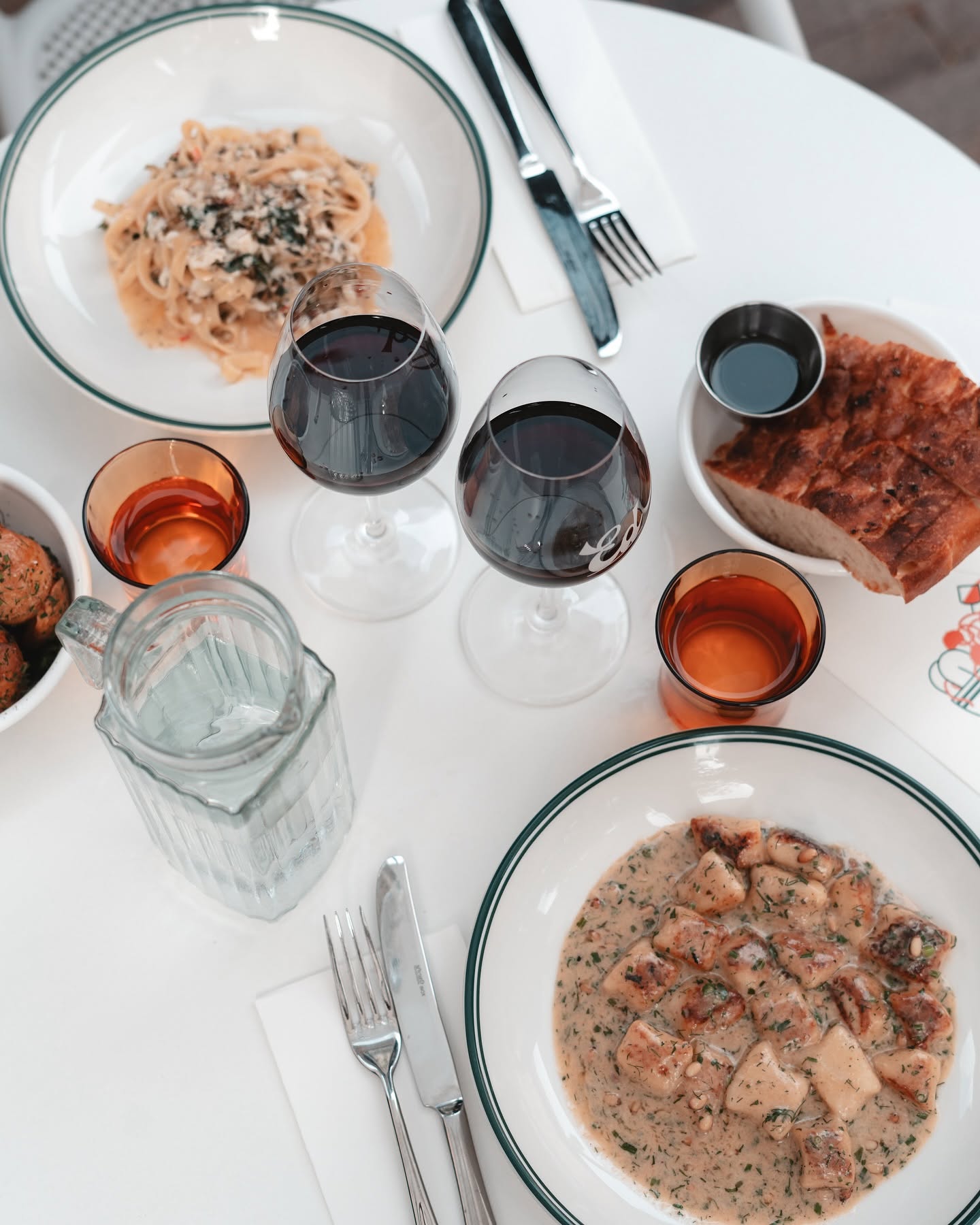 Pasta E Vino table with wine and fresh pasta